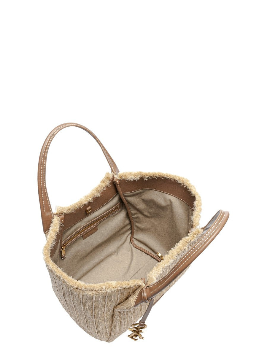 Shopper in paglia intrecciata con charm logo-Emporio Armani-Borse a spalla-Vittorio Citro Boutique