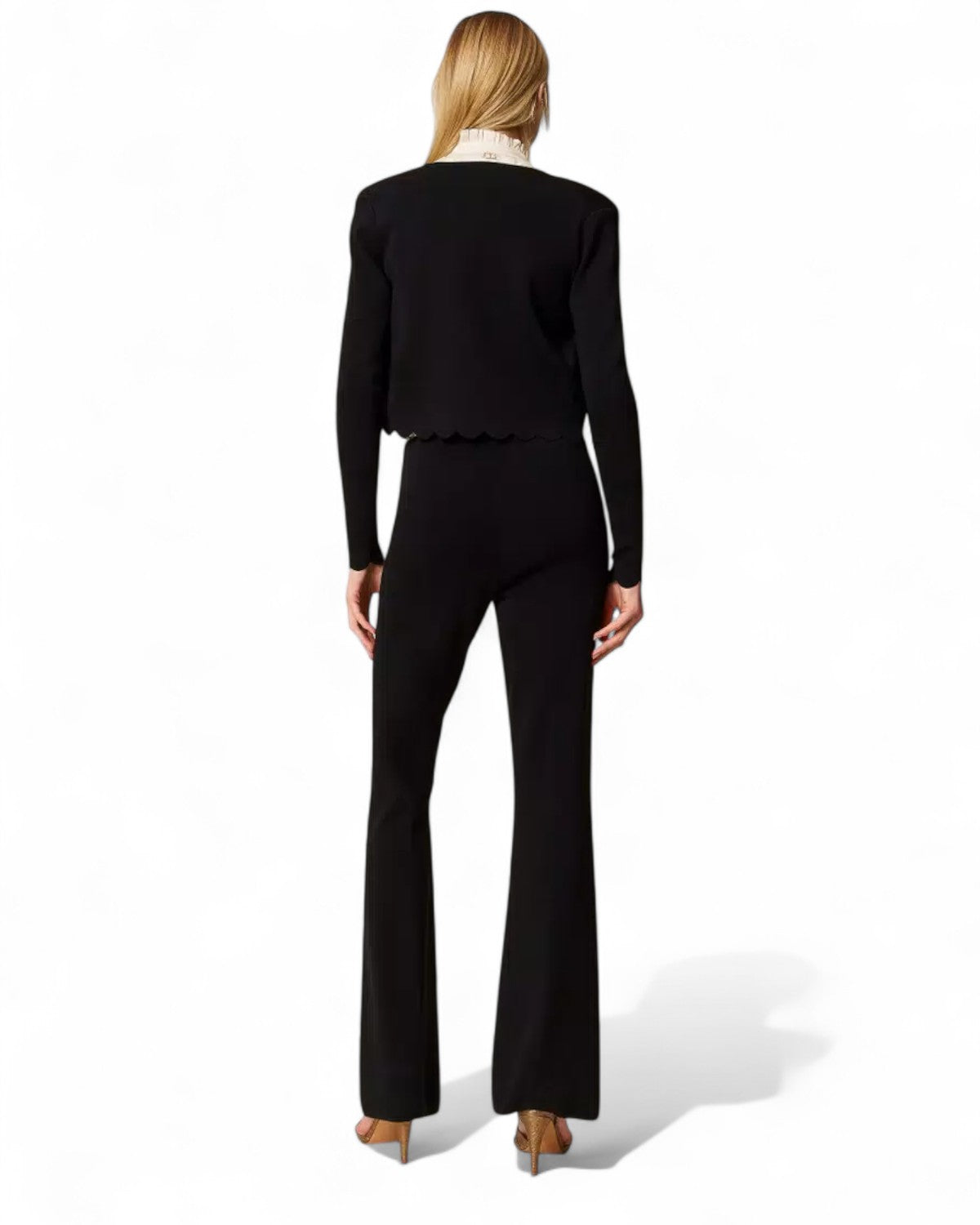 Retro dei pantaloni flare maglia neri da donna, vestibilità slim con gamba ampia, perfetti per outfit eleganti.