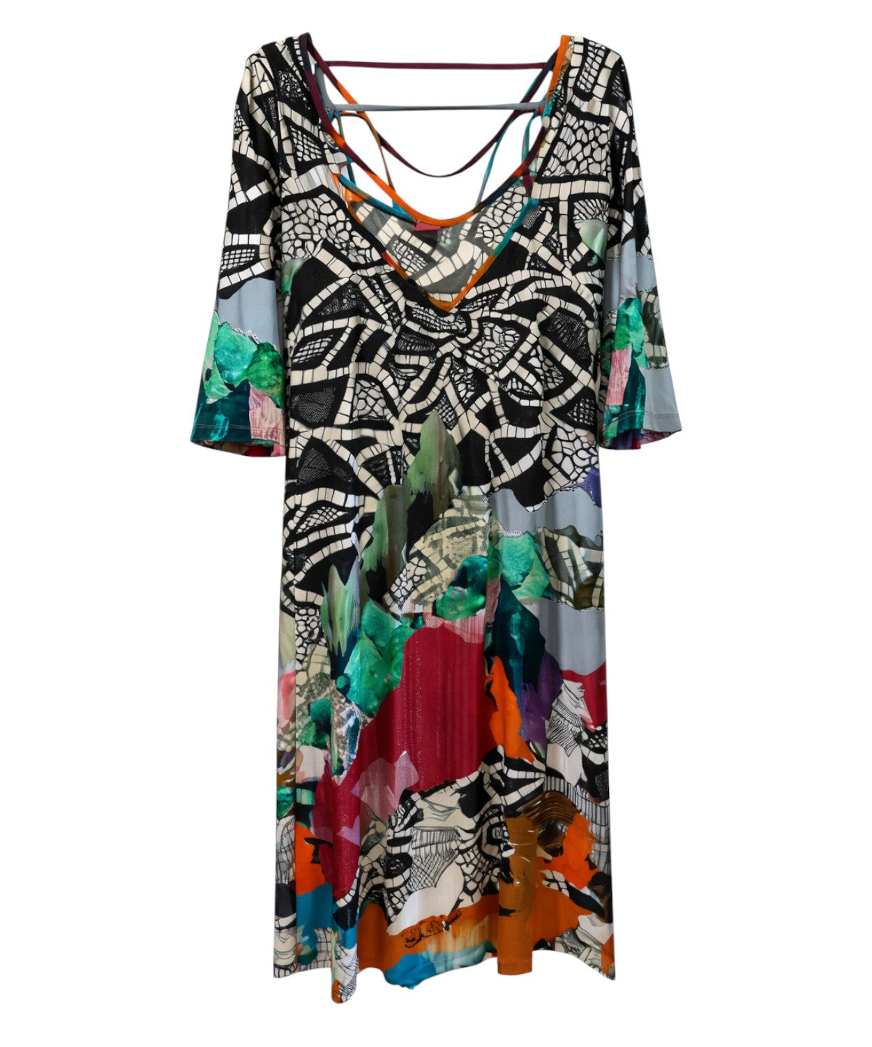 Abito asimmetrico con scollo intrecciato e fantasia