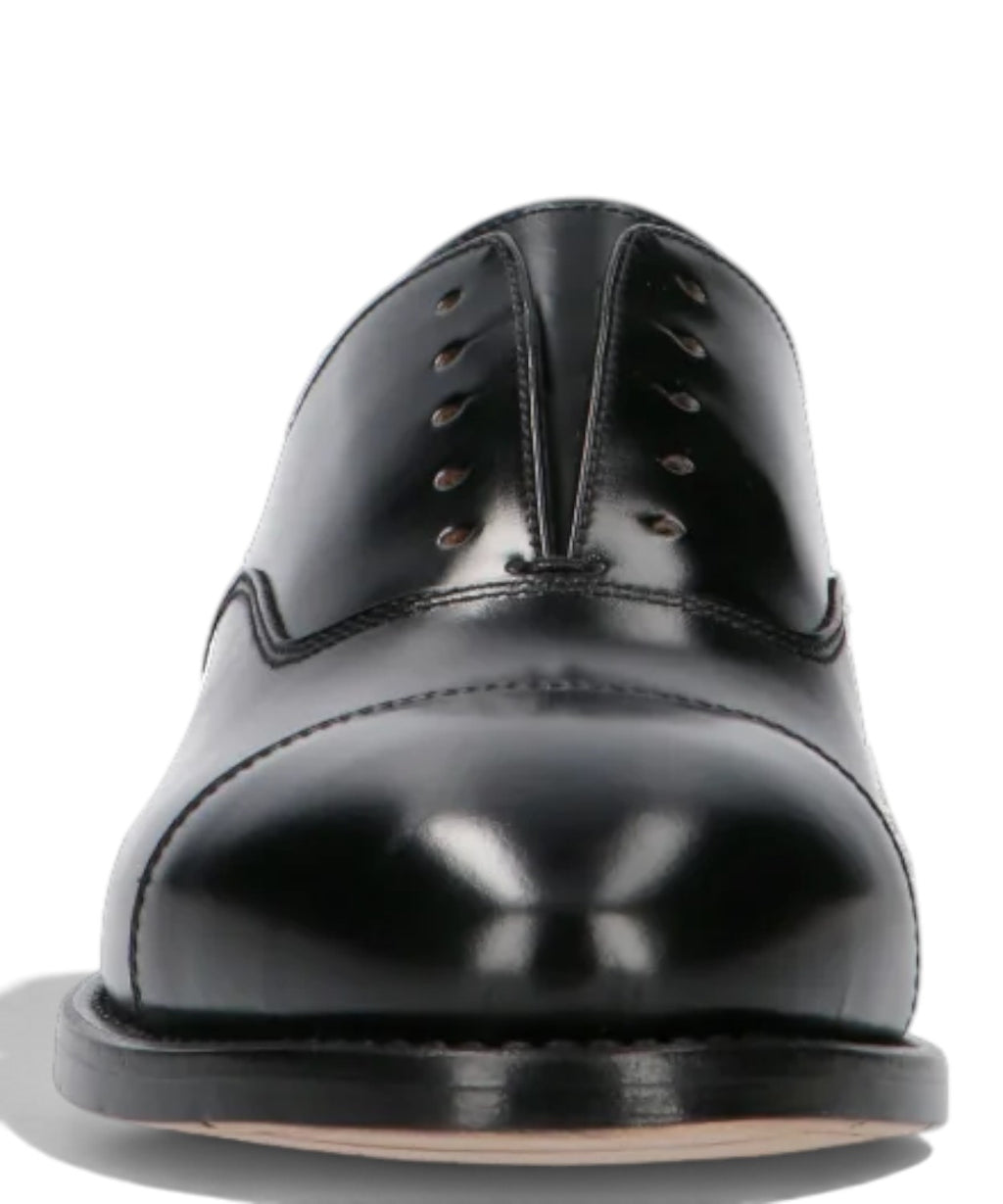 Stringata Uomo Premiata: Eleganza in Pelle Nera