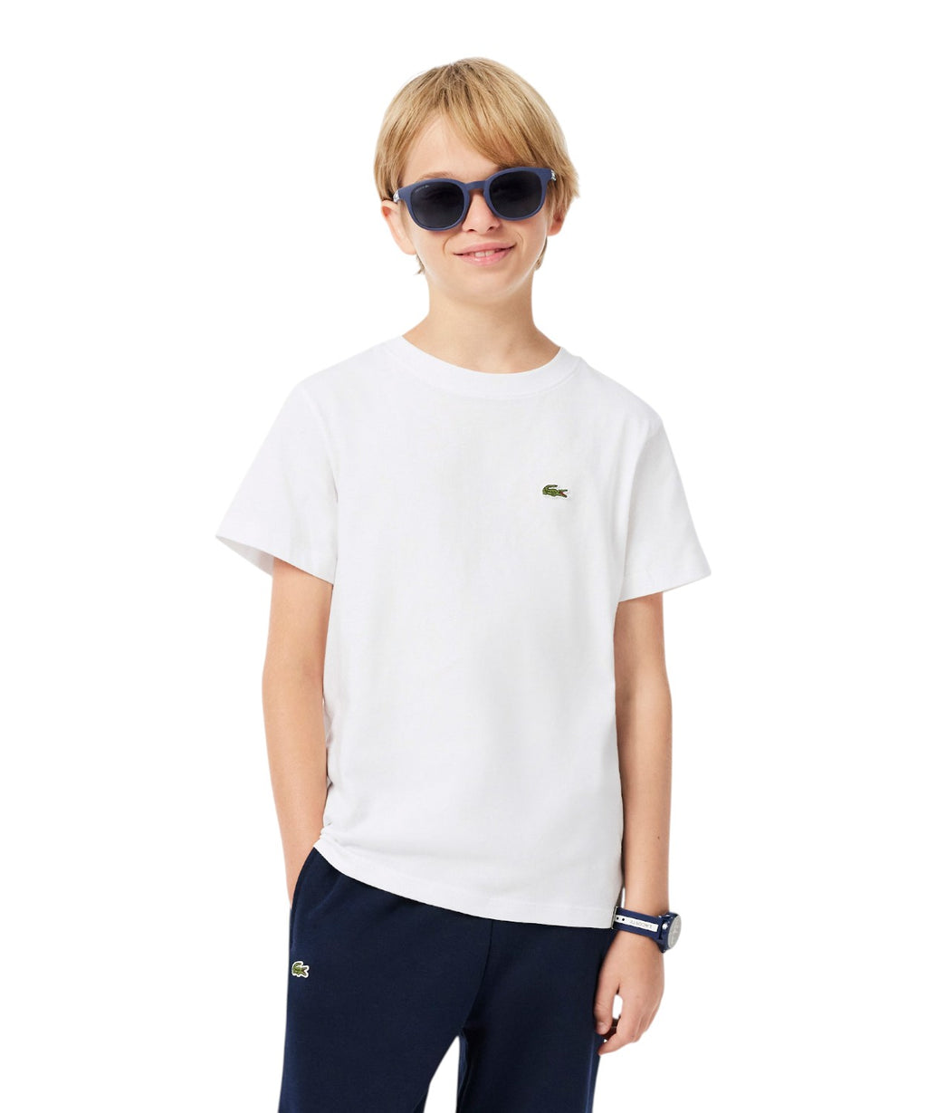 Scopri la T-shirt Lacoste bambino unisex in cotone