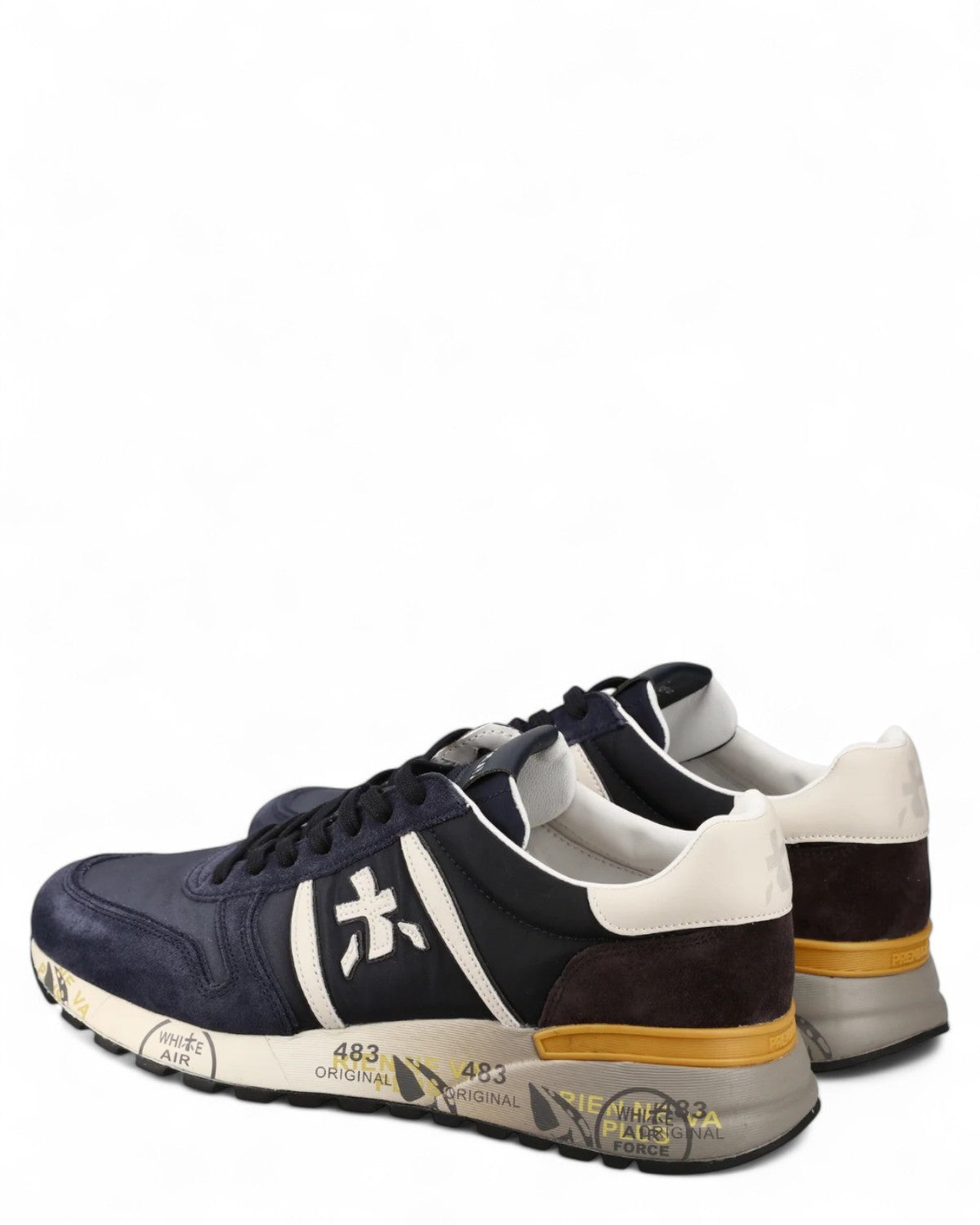 Retro delle sneakers Lander 7702 Premiata con tallone in pelle marrone e bianca, suola decorata e design moderno per uso quotidiano.