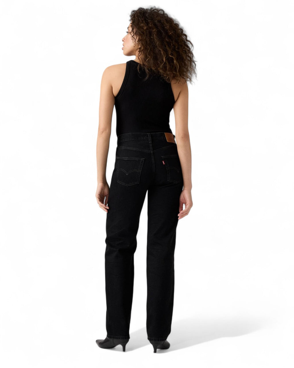 Retro dei jeans Levi's 501 anni '90 da donna, stile vintage con tasche posteriori classiche e patch in pelle sul retro.