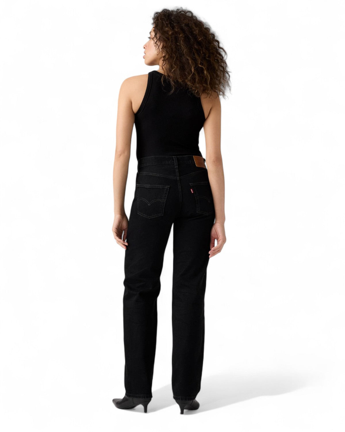 Retro dei jeans Levi's 501 anni '90 da donna, stile vintage con tasche posteriori classiche e patch in pelle sul retro.